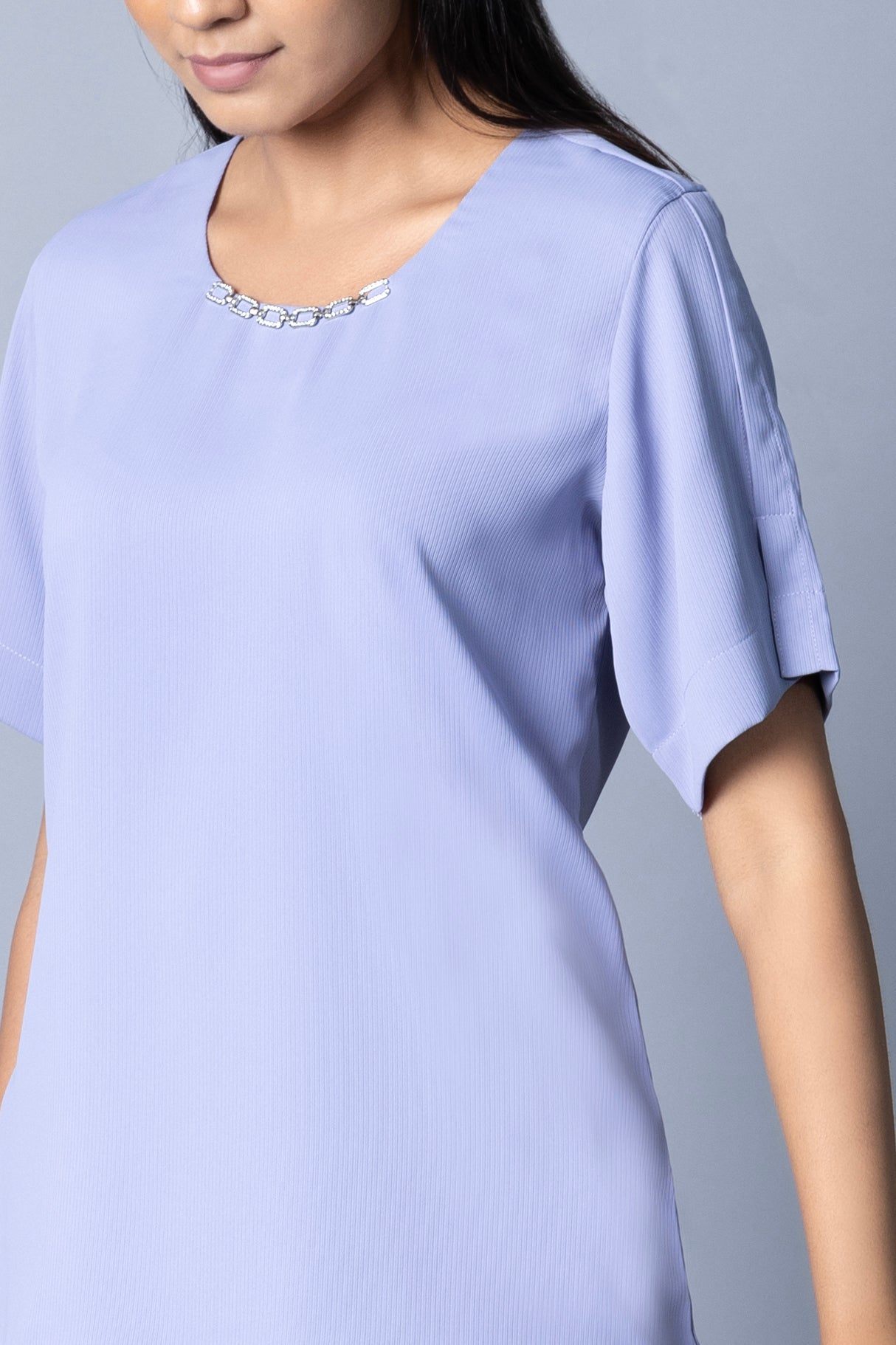 Top with detail overlap sleeve