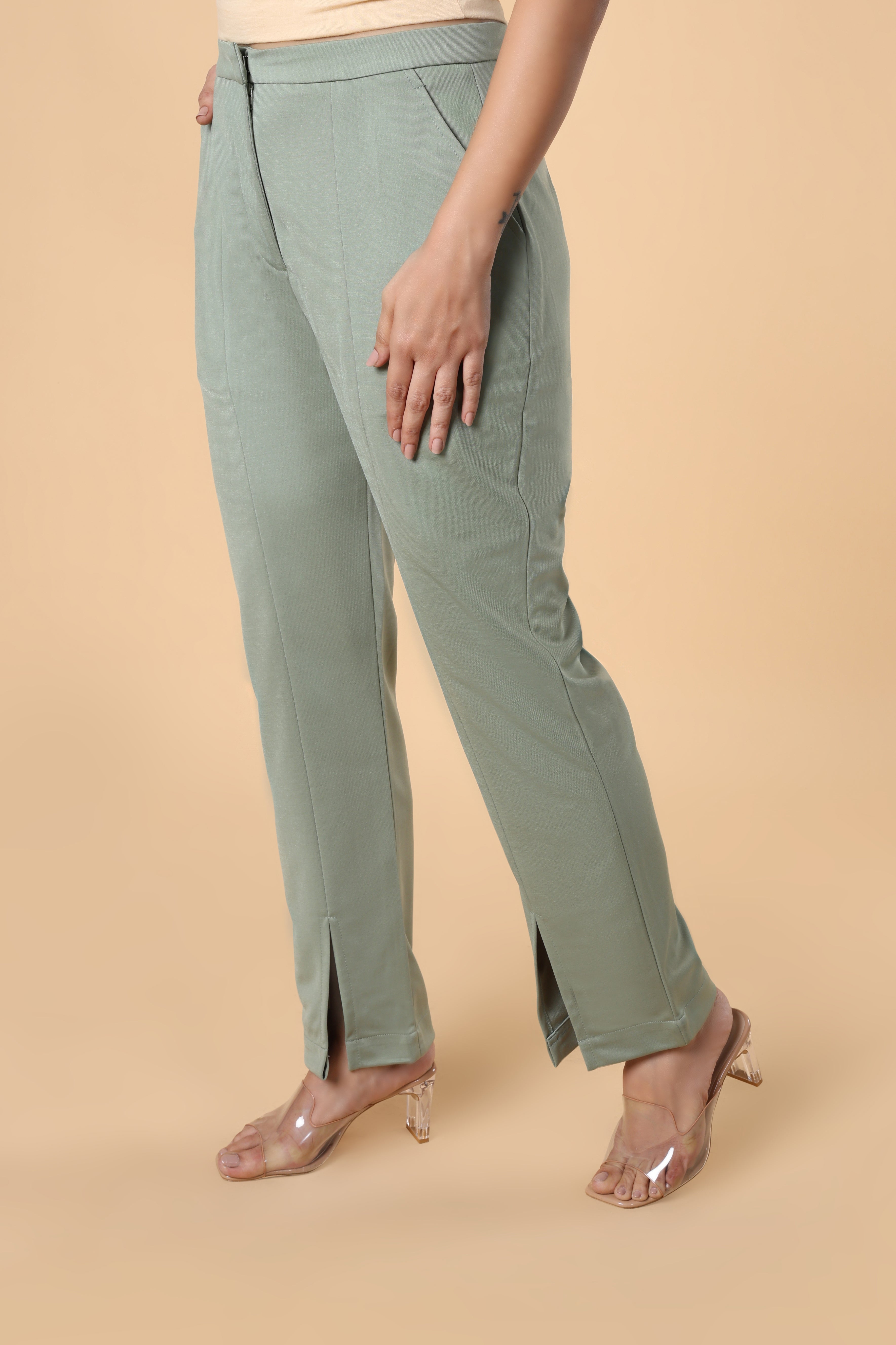 Mid rise slit hem parallel trouser with front zip & side pockets